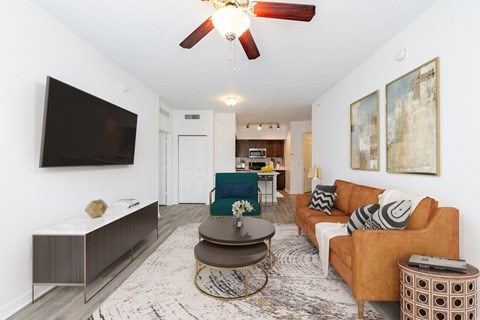 a living room with a couch and a tv